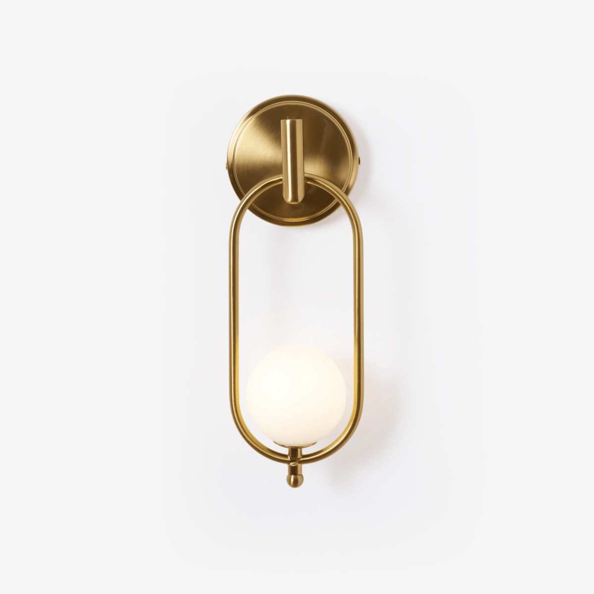 Aurea brass wall light with slim hardwired profile